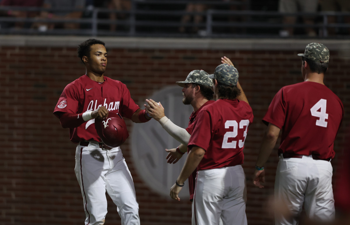 Alabama baseball player Andrew Pinckney (21) celebrates against Boston College at Sewell-Thomas Stadium in Tuscaloosa, Ala. on Sunday, June 4, 2023.